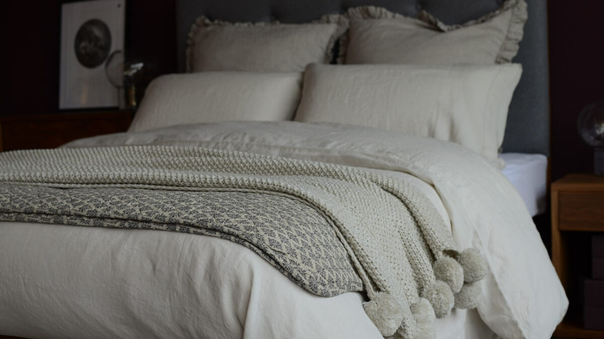 washed vintage linen limestone quilted cotton thow knitted pompom throw