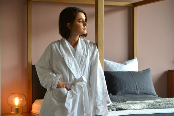 traditional white cotton dressing gown with embroidered lapels cuffs and hems