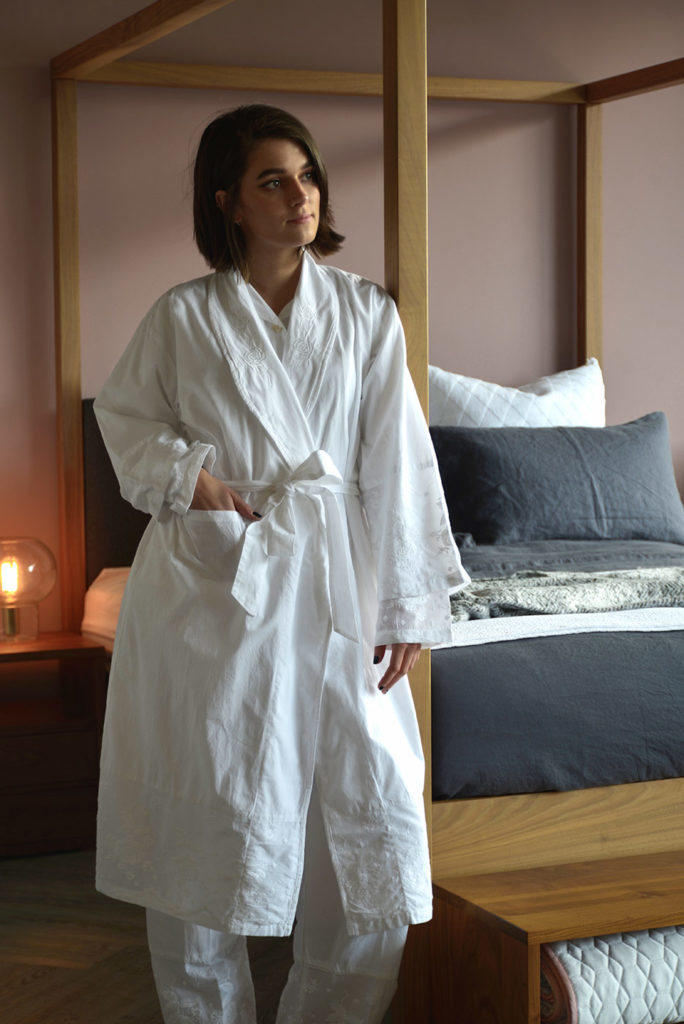 traditional white cotton dressing gown with embroidered lapels cuffs and hems