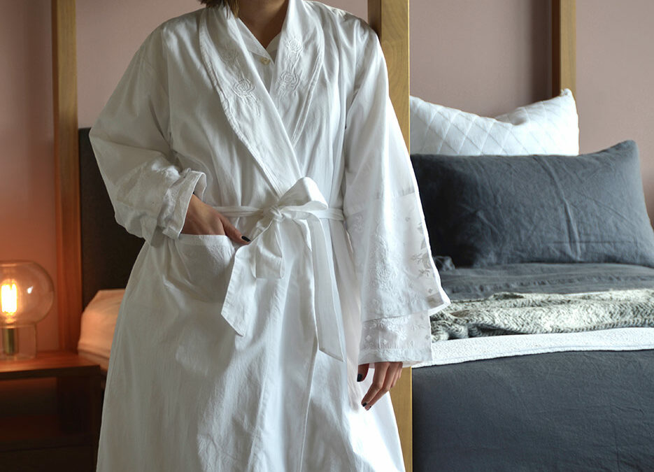 white embroidered robe and pyjamas