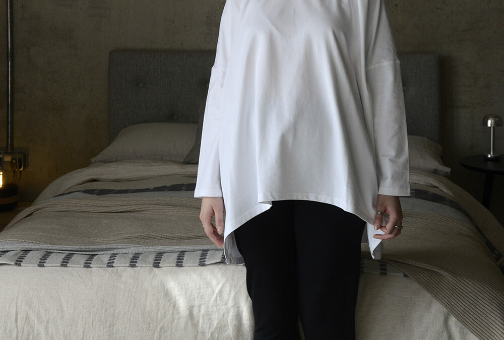 white long sleeve top with round neck portrait