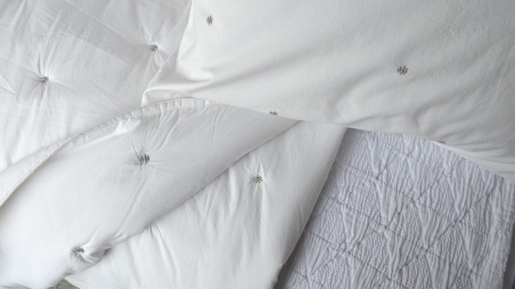 white-quilt-and-pillowcase-detail