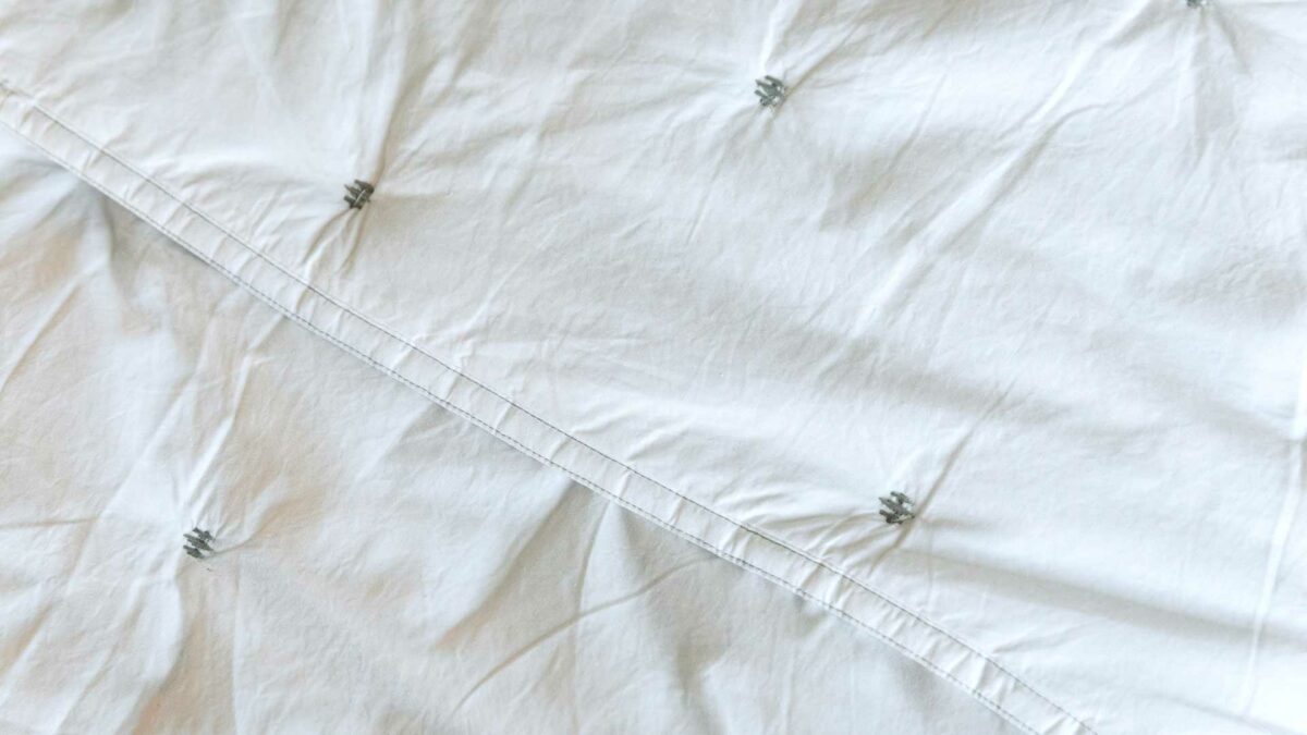 white quilt - stitched detailing