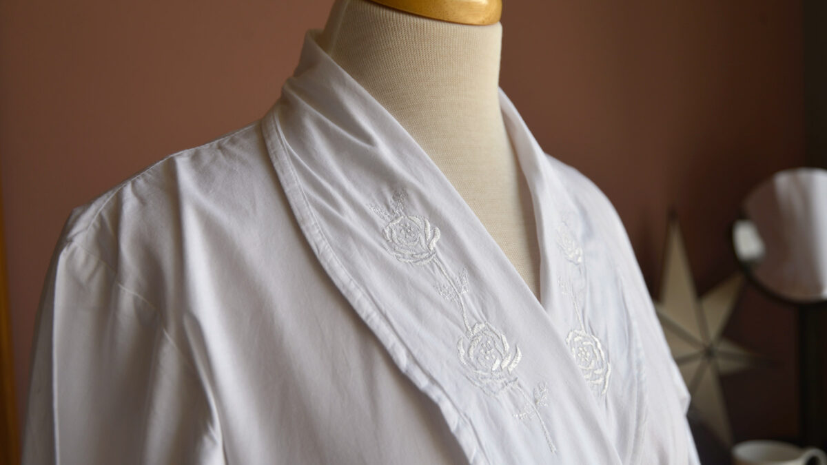 white rose embroidery on white robe