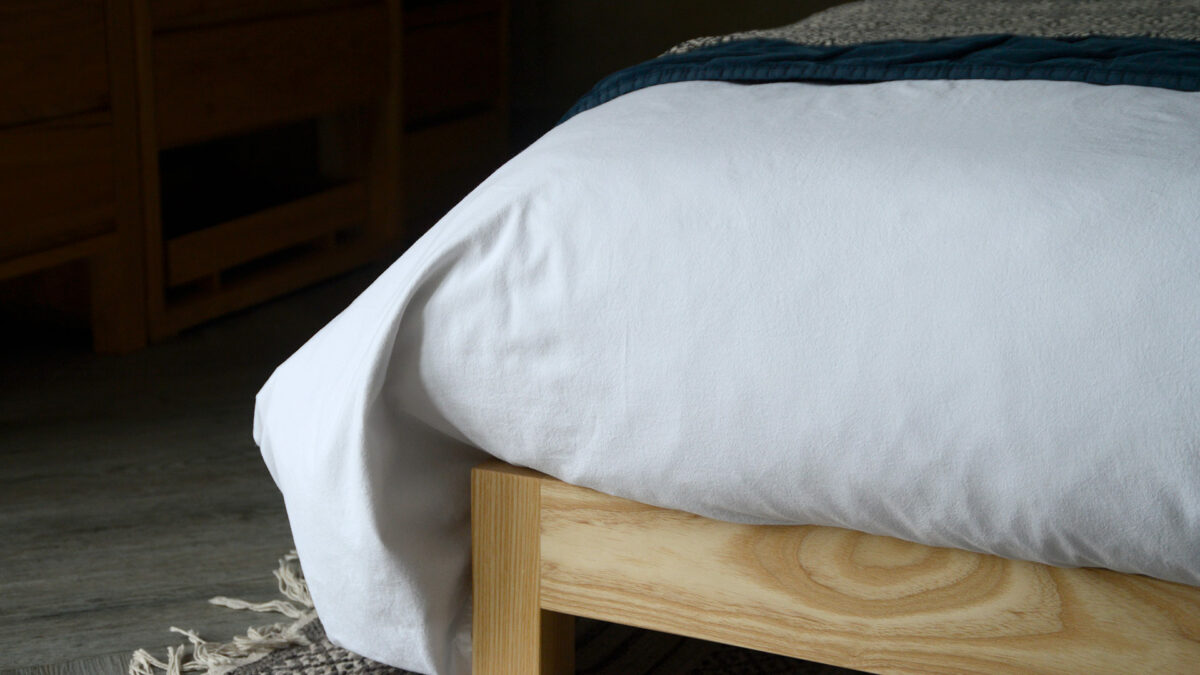 white stonewash bedding detail