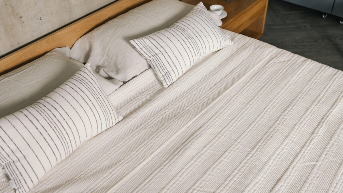 white striped stitched design bedspread