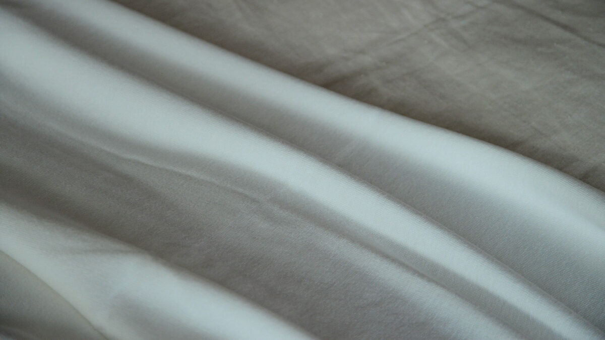 white super soft fine knit blanket close up detail