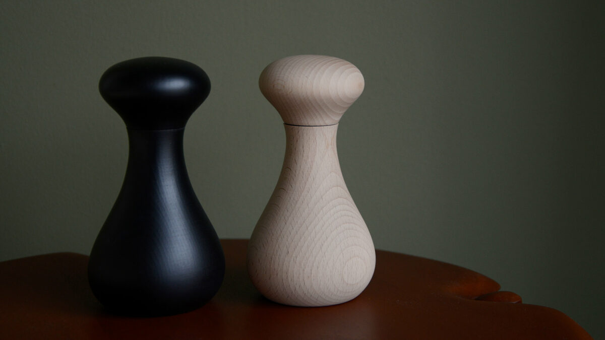 curvy beech wood salt, pepper or spice grinders in natural and black finish