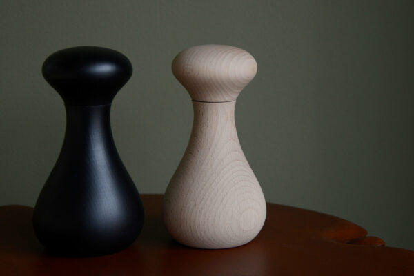 curvy beech wood salt, pepper or spice grinders in natural and black finish