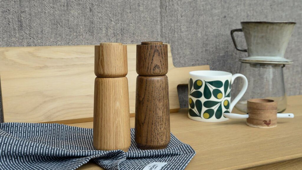 modern wooden salt and pepper grinders by Blomus