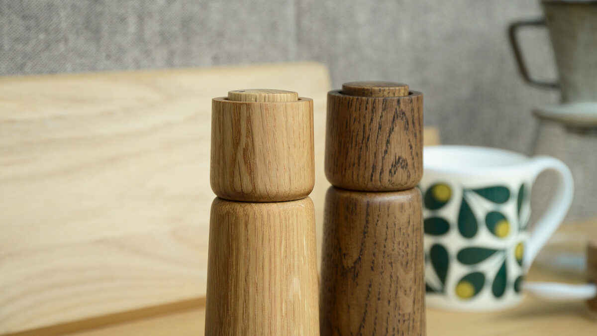 a closer view of the modern wooden salt and pepper grinders