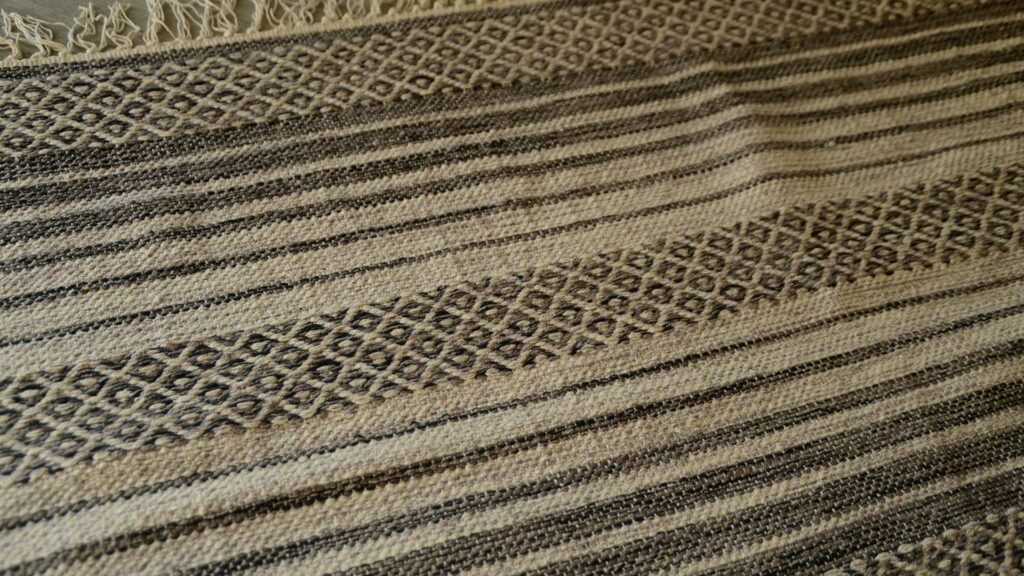 woven boho rub in ecru and charcoal