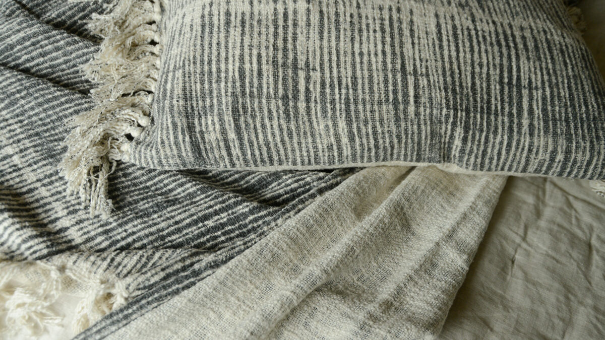 woven throw and cushion grey stripe