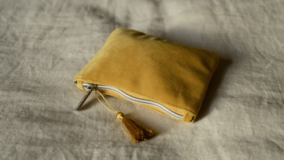 Velvet zipped pouch in mustard yellow