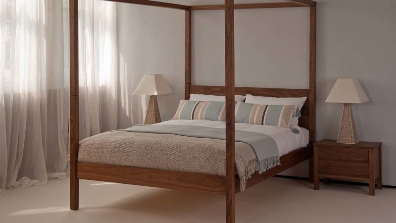 Our hand made Orchid Four Poster bed shown in Walnut