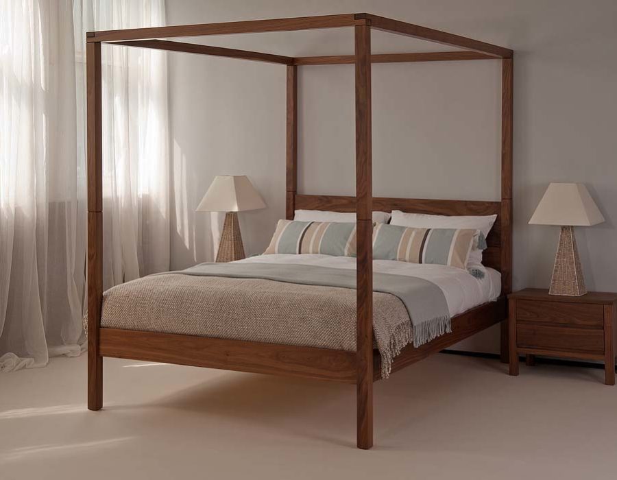 Our hand made Orchid Four Poster bed shown in Walnut