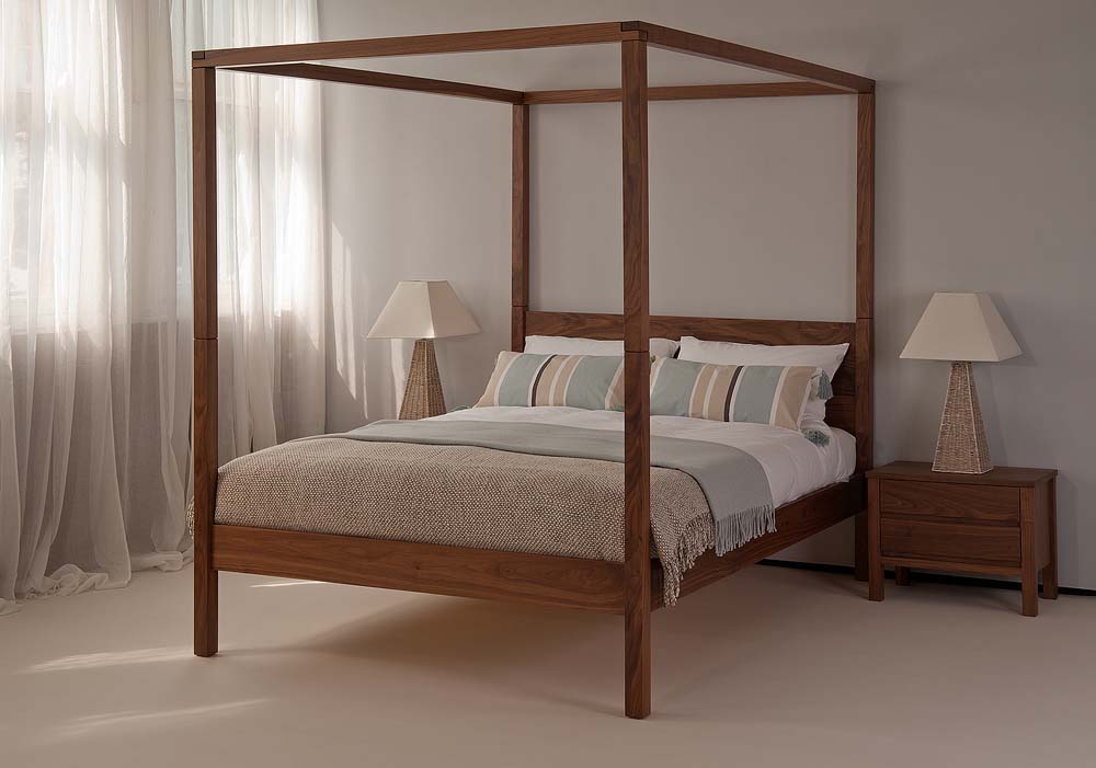 Our hand made Orchid Four Poster bed shown in Walnut